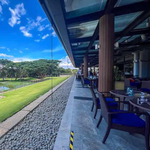 Savour high tea at the club decks overlooking the stunning greens.